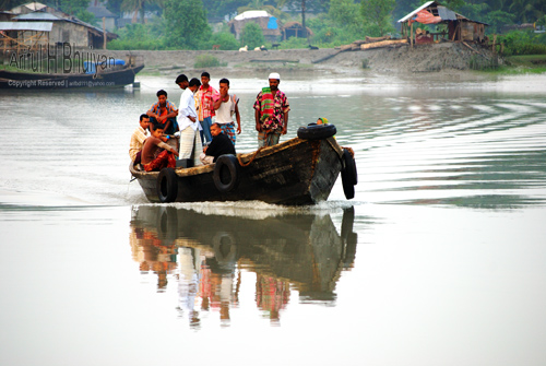 People crossing the river