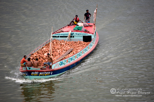 Boat carrying bricks